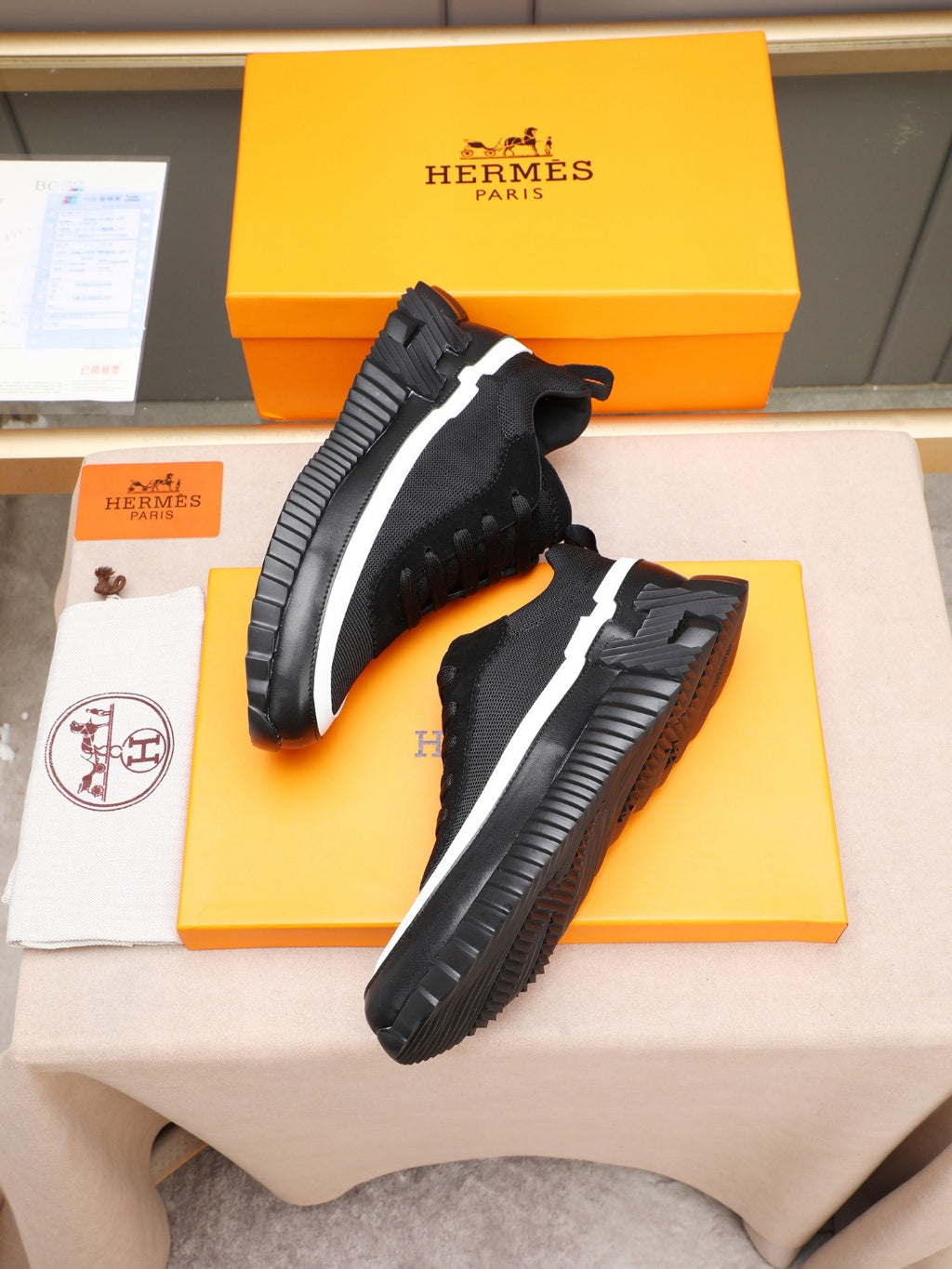Hermes Black Sneakers with White Trim